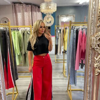 red flared denim jeans